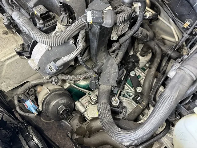 滋賀オートライフハノ　輸入車「MINI」(ZF16)の冷却水漏れ修理（サーモスタッドハウジング、ウォーターパイプ交換）